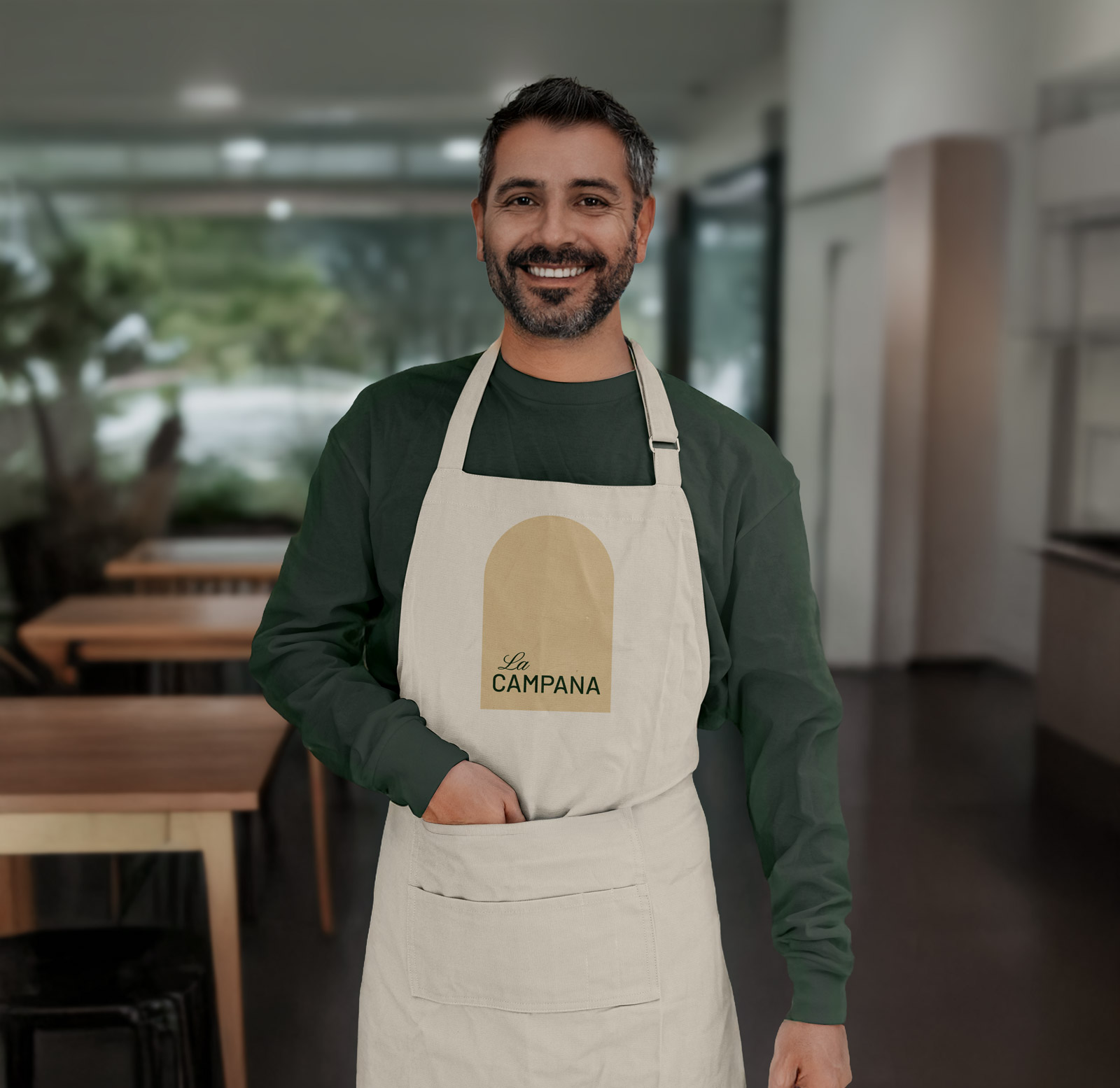 Delantal de la identidad visual del hostal La Campana en Toledo